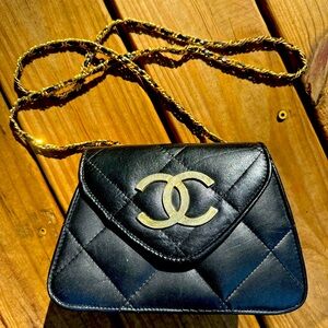 Vintage Chanel quilt black bag gold hardware
